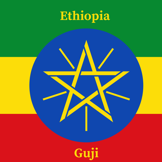 Flag of Ethiopia with a blue circle containing a yellow star on a green, yellow, and red background.  Ethiopia Guji product image.